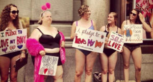 Group Protests Semi-Naked Outside Victoria’s Secret To Insist They Make Lingerie For All Shapes & Sizes